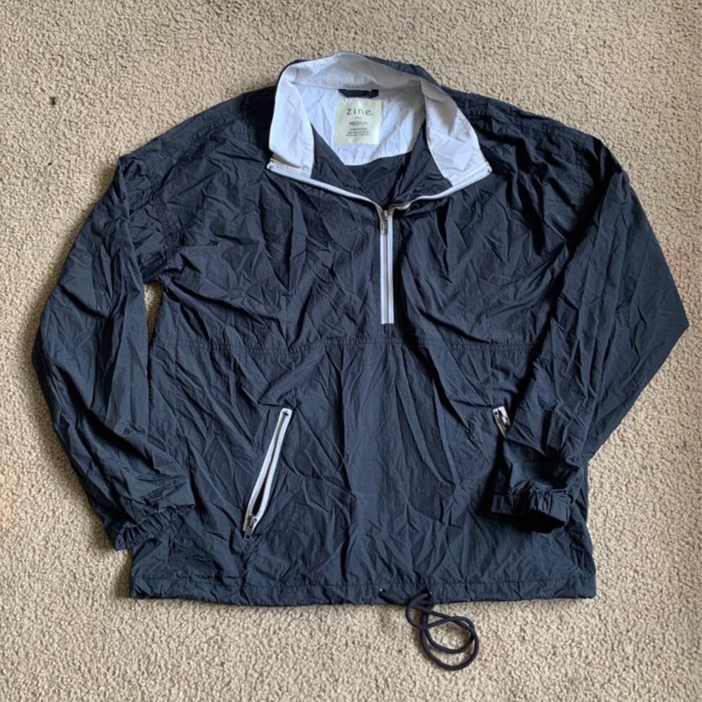 Black windbreaker